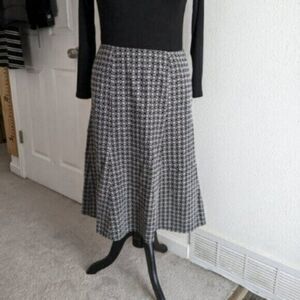 Beautiful Black and White Nine West skirt with embordered fabric